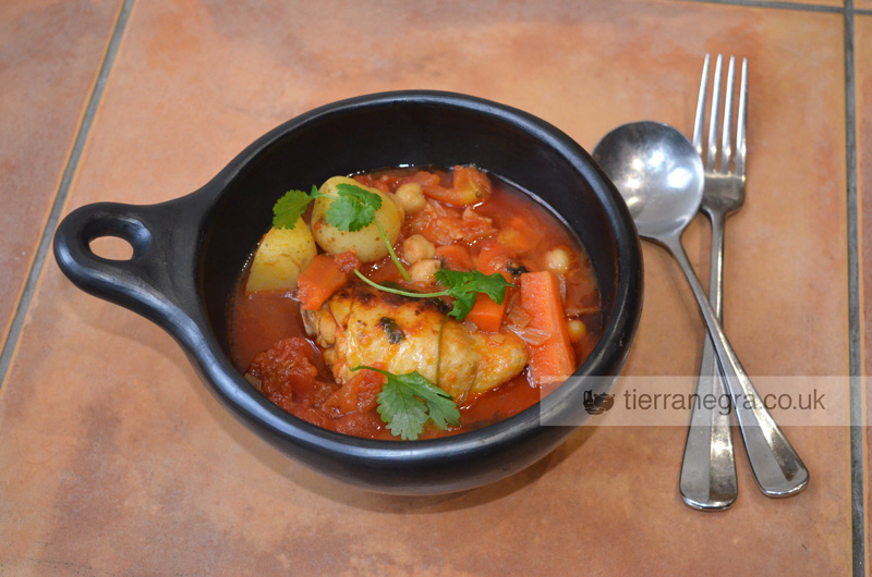 Chicken thighs with chickpeas and potato. A delicious clay pot recipe.