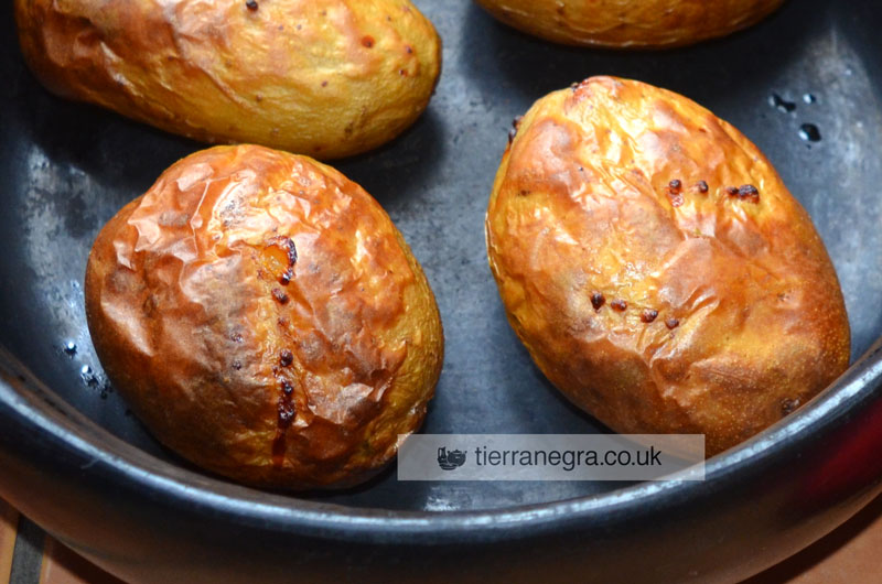 Jacket potatoes baked in a clay pot